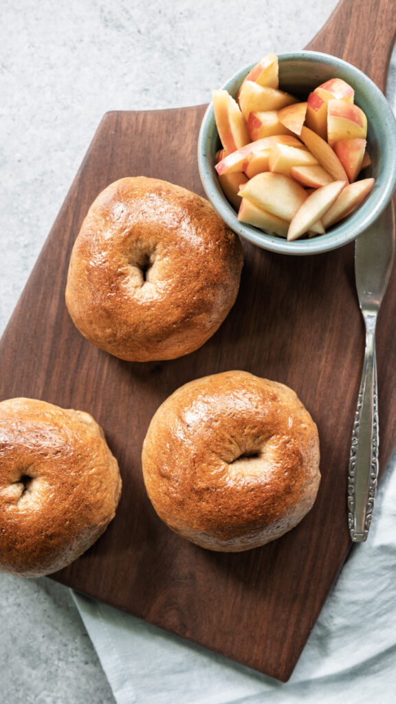 Homemade apple butter sourdough beer bagels baked until golden brown.
