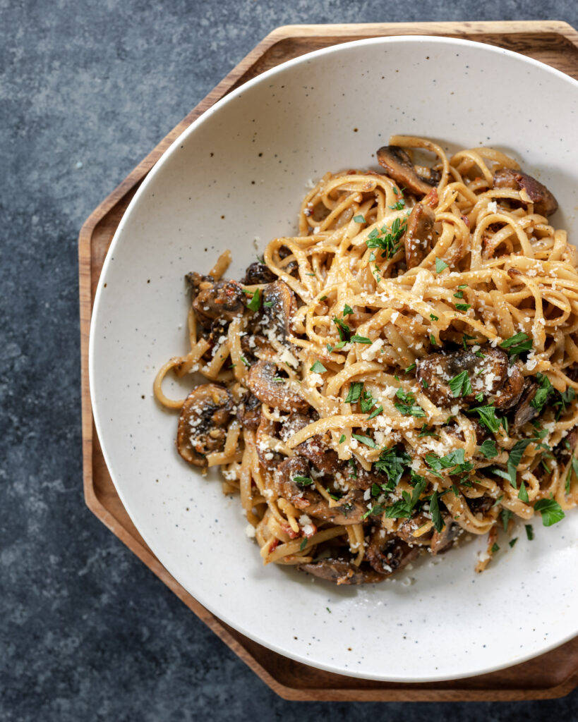 Creamy Mushroom Pasta (Dinner for Two) on a plate, as seen from above at a 90 degree angle.
