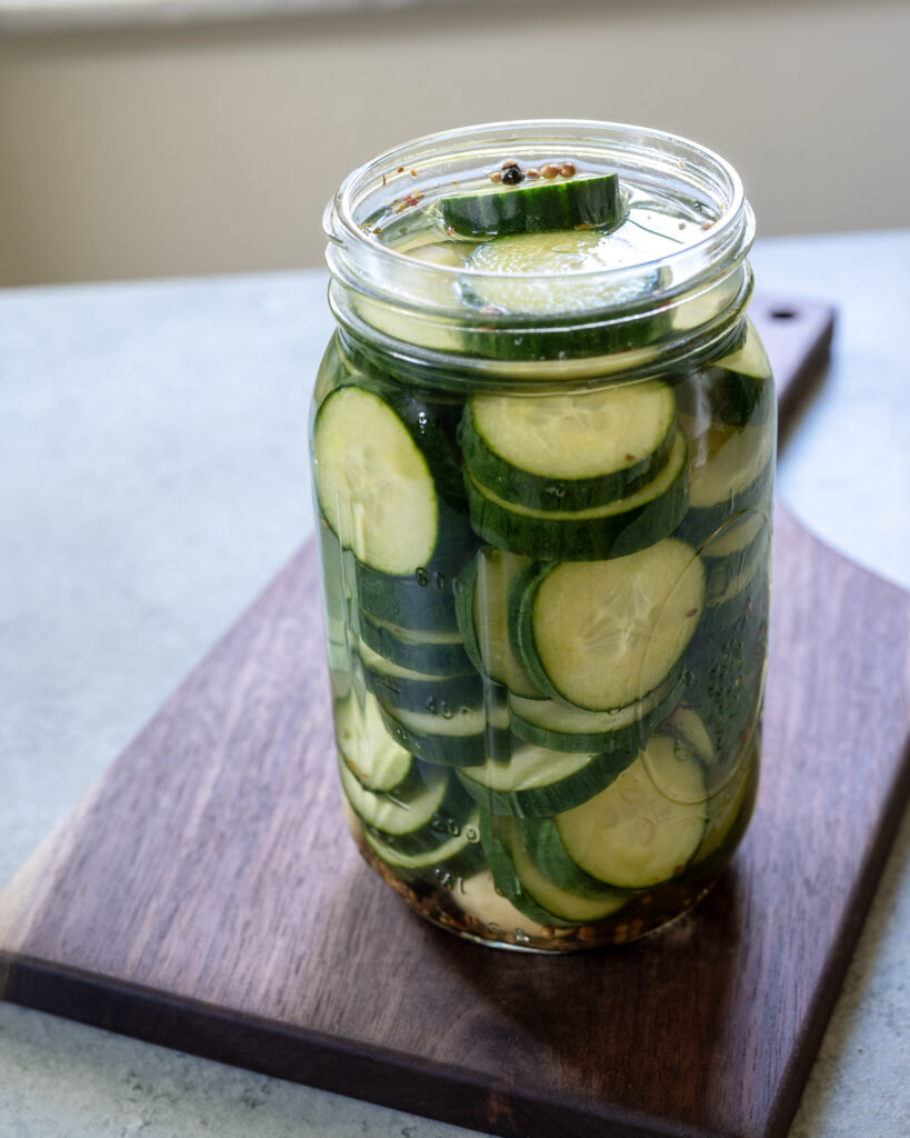 Refrigerator pickled cucumber in glass canning jars