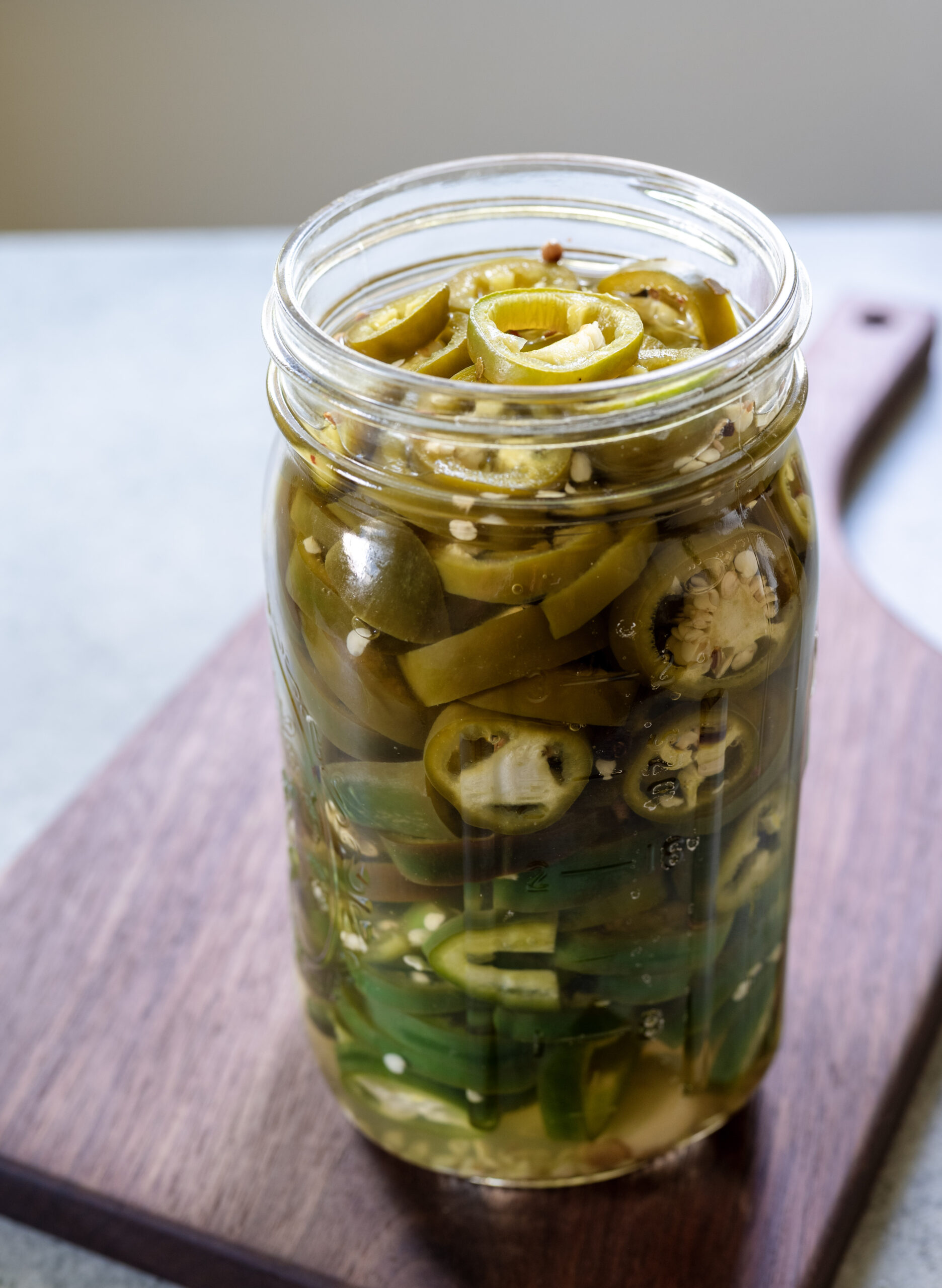 Homemade refrigerator pickled peppers with garlic and pickling spice