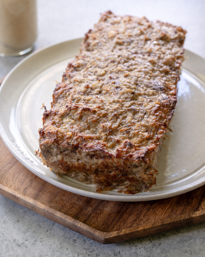 Full cooked Swedish-style meatloaf on a plate.